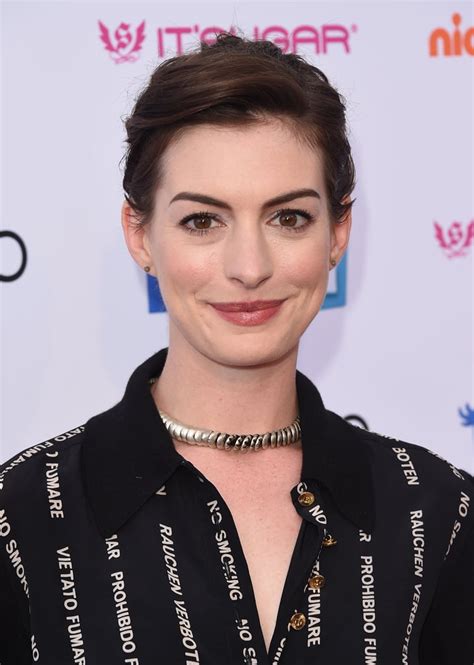 Demure From the Front . . . | Anne Hathaway Best Pixie Hairstyles ...