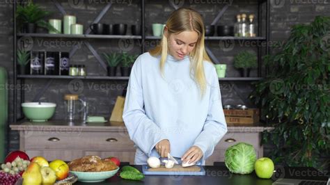 Young Woman Cooking in the kitchen. Healthy Food 11367087 Stock Photo ...