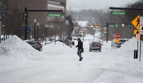 Photos: Jackson residents dig out after overnight snowstorm - mlive.com