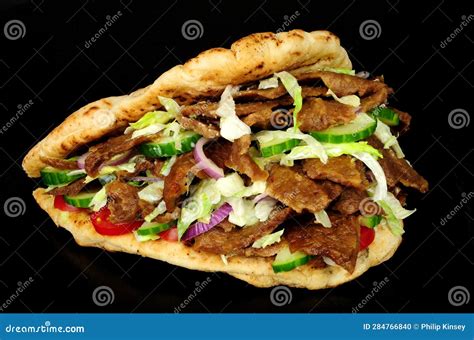 Doner Kebab and Salad in a Naan Bread Stock Photo - Image of sandwich ...