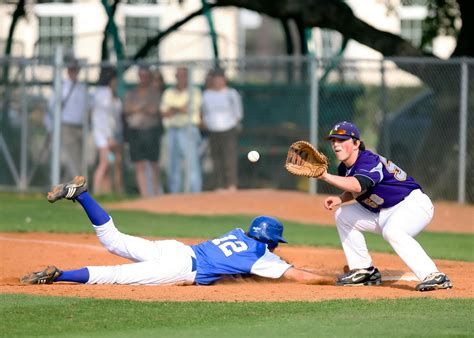 Two Man Playing Baseball during Daytime · Free Stock Photo