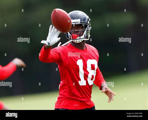 Atlanta Falcons wide receiver Calvin Ridley (18) catches a ball as he runs a drill during an NFL ...