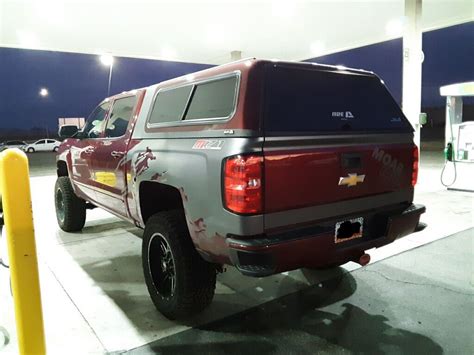 Lifted Chevy Silverado With Camper Shell