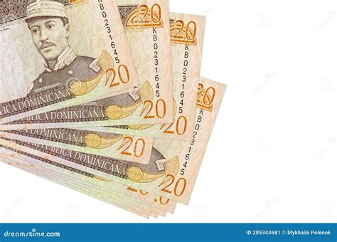 20 Dominican Peso Bills Lies in Small Bunch or Pack Isolated on White. Mockup with Copy Space ...