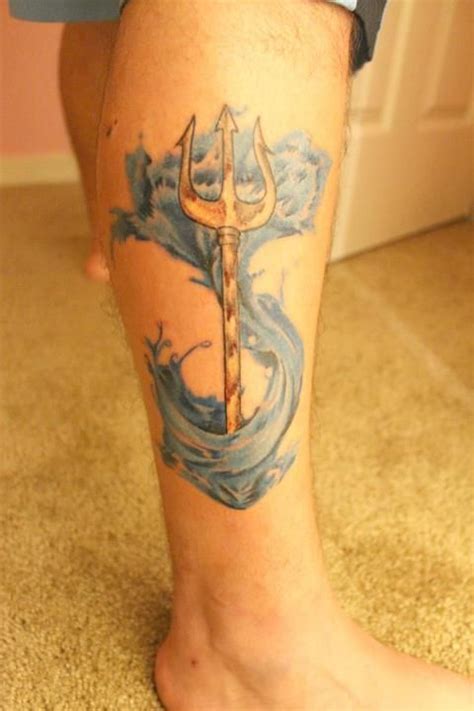 Trident or Anchor tattoo? Anchors are kind of common...but awesome. I might go with a trident ...
