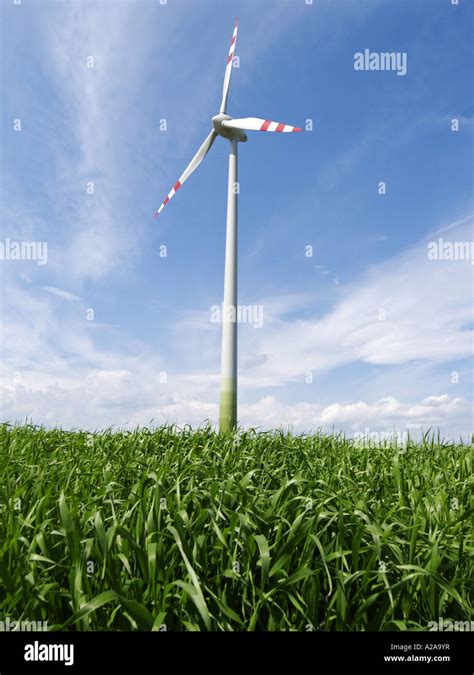 field with wind turbine Stock Photo - Alamy