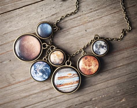 Solar System Necklace and Bracelet Are a Perfect Pair of Planet Jewelry