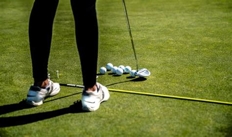 Titrist Golf Ball Near Golf Hole · Free Stock Photo