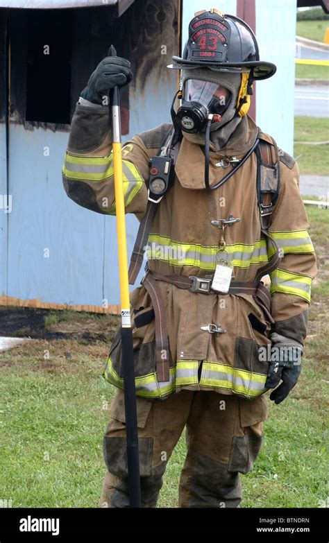 portrait of a firefighter in full turnout gear Stock Photo - Alamy