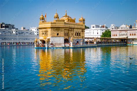 Holy sight of golden temple and its reflection Stock Photo | Adobe Stock