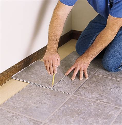 How to Lay a Vinyl Tile Floor | Vinyl tile flooring, Tile floor, Laying vinyl flooring