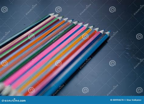 Colored Pencils Set on Black Wood Background, Stock Photo - Image of leisure, blue: 88994678