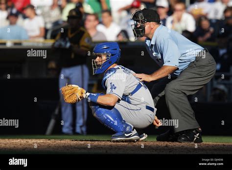 Dodgers catcher Brad Ausmus and umpire Brian O'Nara behind the plate ...