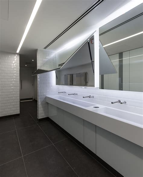 Corian trough style vanity units and Tego folding mirrors. Commercial ...