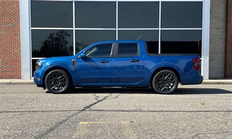 Body colored, lowered Atlas Blue Maverick on 20's Mach-E Wheels ...