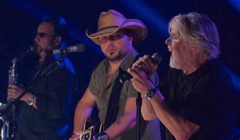 Jason Aldean and Bob Seger perform "Turn the Page" live on stage