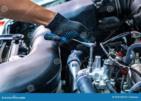 Auto Mechanic Working with Open Car Hood in Garage. Car Repair Service. Stock Photo - Image of ...