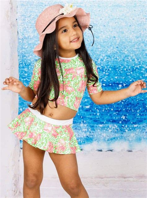 Your little beach cutie can splash the day away in style with this ...