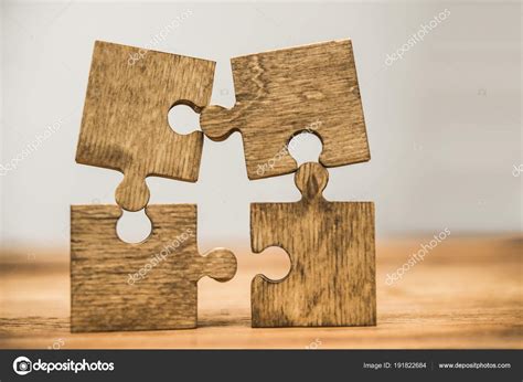 Four Wooden Puzzle Pieces Wooden Background Concept Connection People ...