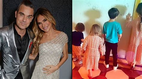 Robbie Williams' wife Ayda Field admits they make kids fly in economy ...