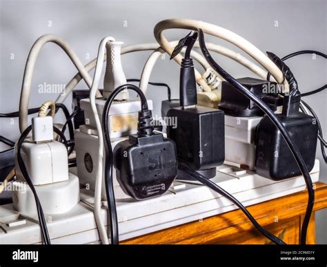 Overloaded sockets uk hi-res stock photography and images - Alamy