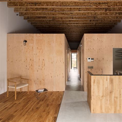 Wooden boxes define rooms and mezzanines in Loft House by CAPD | Meuble ...