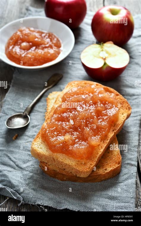 Apple jam on toast bread, sweet sandwich Stock Photo - Alamy