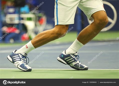 Grand Slam champion Novak Djokovic of Serbia wears custom Adidas tennis ...