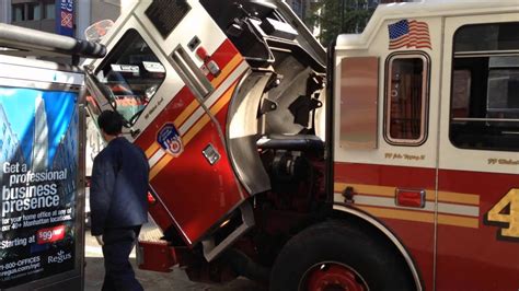 FDNY LADDER 4, AS NEVER SEEN BEFORE, BEING SERVICED BY FERRARA FIRE APPARATUS INC. MECHANICS ...