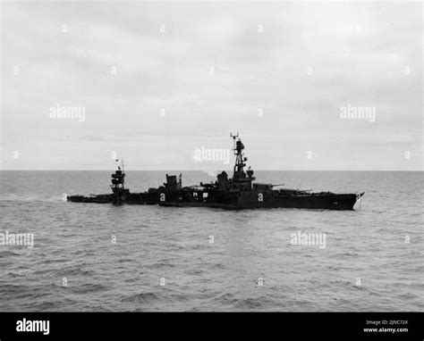 USS Chicago sinking on 30 January 1943 after being torpedoed during the ...