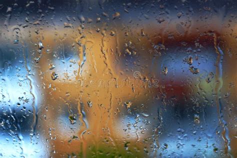 Raindrops on window stock photo. Image of drops, colorful - 183297486