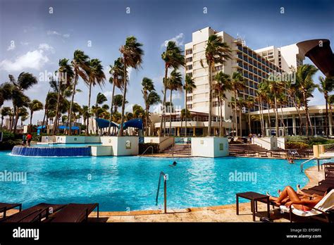 People Relaxing at Poolside, Caribe Hilton, San Juan, Puerto Rico Stock ...