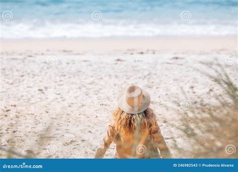 Girl with hat on the beach stock image. Image of beach - 246982543