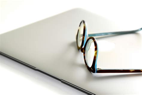 Black Framed Wayfarer Eyeglasses on Book · Free Stock Photo