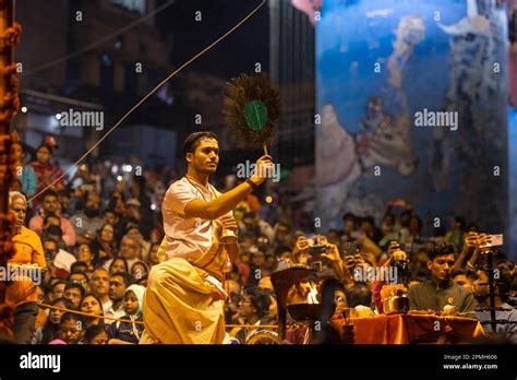 Ganga aarti, Portrait of an young priest performing river ganges ...