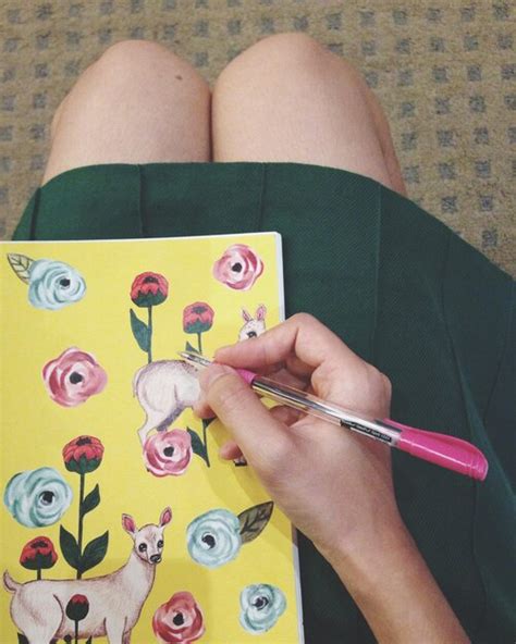 Premium Photo | Directly above view of girl writing in diary