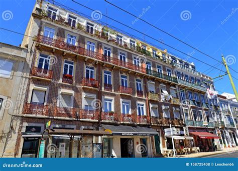 Traditional Colorful Buildings with Azulejo Tiles Facade in the Old Lisbon Neighborhoods ...