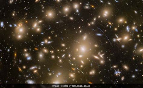 Hubble Captures Massive Galaxy Cluster In Stunning Detail