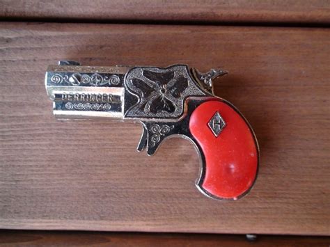 VINTAGE LESLIE HENRY RED GRIPPED DERRINGER TOY CAP GUN – Wild West Toys