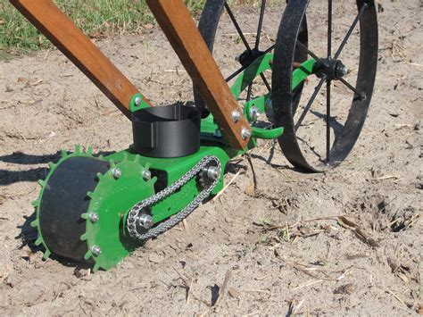 Hoss Seeder attached to Double Wheel Hoe. | Seed planter, Garden hoe, Garden seeds