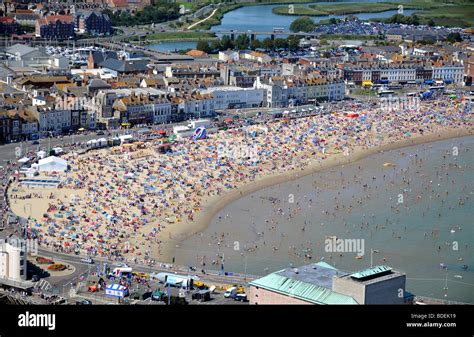 Beach, Weymouth beach, Aerial view of tourists on Weymouth beach during hot weather in Dorset ...