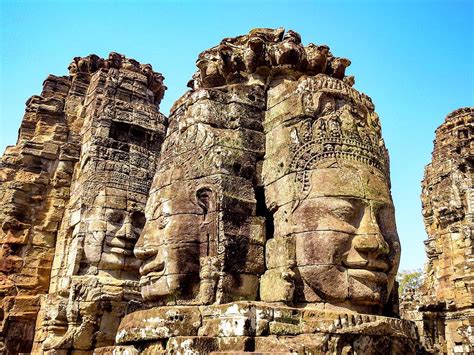 Smiling Faces of Bayon Temple Photograph by Marge Sudol - Pixels