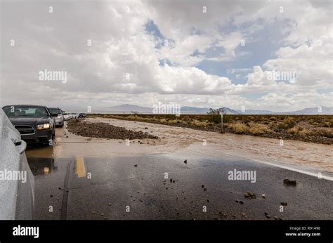 AUGUST 4 2018 - DEATH VALLEY, CALIFORNIA: A flash flood destroys the road through Death Valley ...