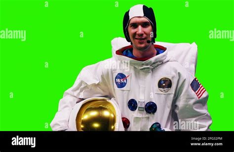 NASA astronaut giving a salute on a chroma key green screen Stock Video Footage - Alamy