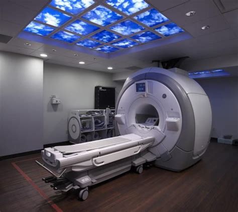 Low lighting levels and illuminated sky imagery in the MRI suite calm the patient during the ...