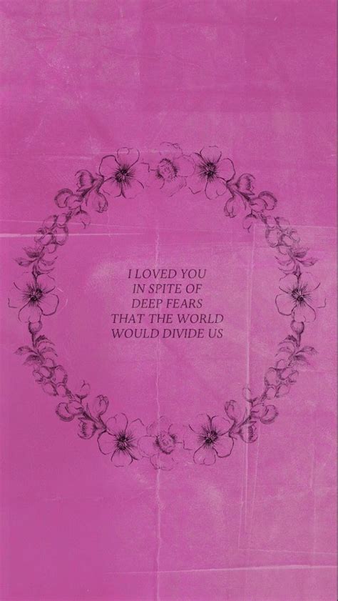 a pink background with black writing and flowers in the center that ...