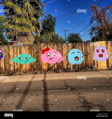 Graffiti on a wood fence Stock Photo - Alamy