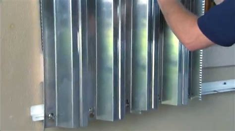 Hurricane Preparedness: Metal Storm Shutter Installation - YouTube