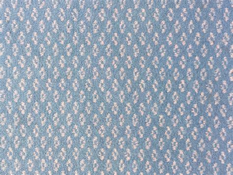 Cheap carpet pink diamond pattern on blue | Free Textures