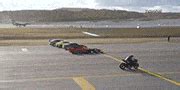Watch an F1 car, a fighter jet, a superbike, an airliner and supercars drag race